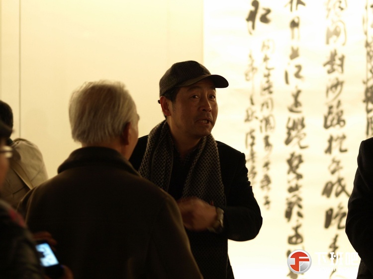 1全国政协领导周国富和鲍贤伦主席来卢乐群书法展厅参观 (4).jpg